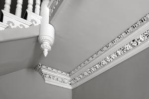 Plaster cornice in passage